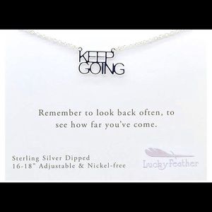 Lucky Feather “KEEP GOING” necklace.